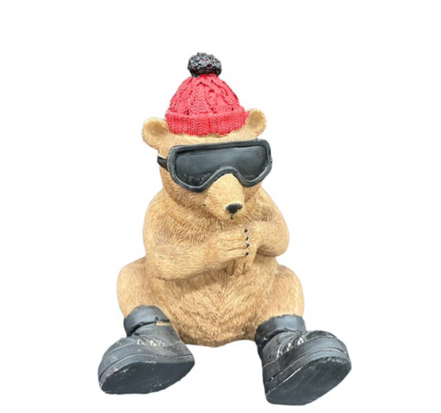 OURS ASSIS AVEC SON BONNET